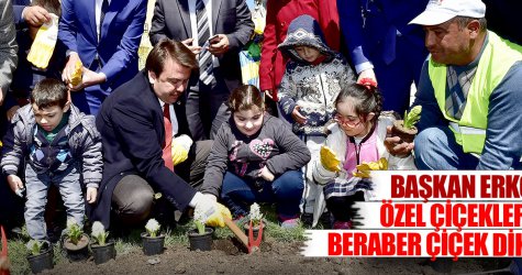 Başkan Erkoç özel çiçeklerle beraber çiçek dikti