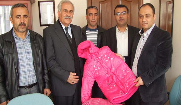 ENERJİ İŞÇİLERİNDEN ÖĞRENCİLERE KABAN YARDIMI