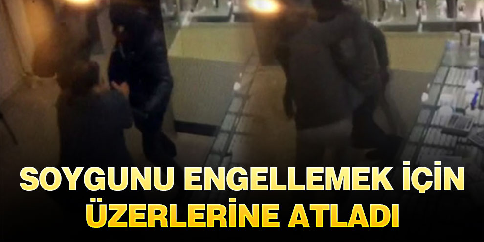 Pompalı tüfekli soyguncuların üzerine atladı!