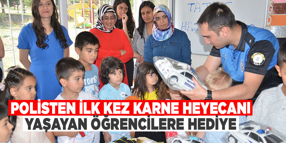 Polisten ilk kez karne heyecanı yaşayan öğrencilere hediye