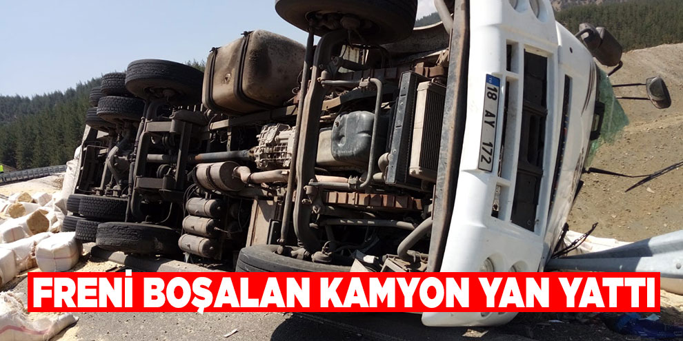 Freni boşalan kamyon yan yattı