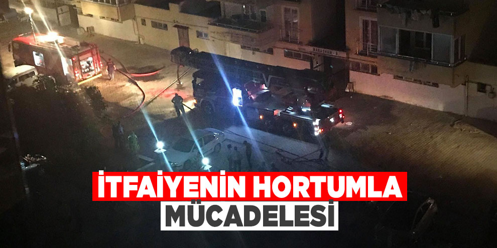 İtfaiyenin hortumla mücadelesi