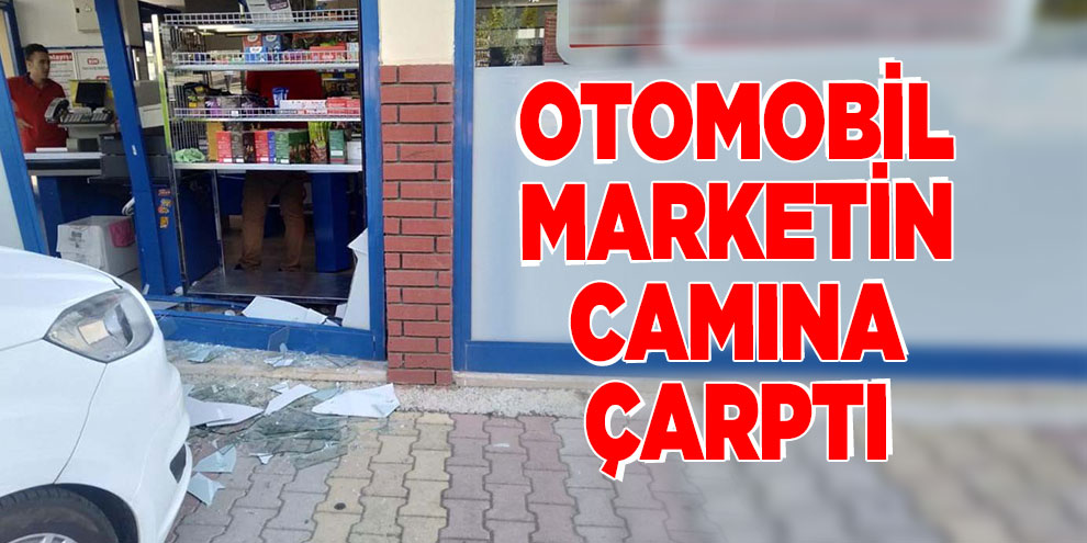 Otomobil marketin camına çarptı