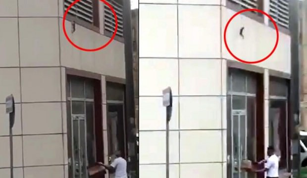 2. kattan düşen kediyi havada yakaladı