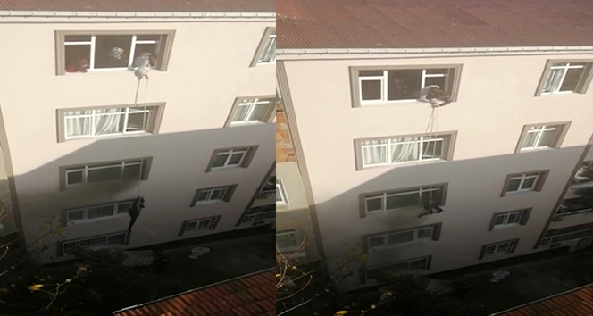 Yangında mahsur kalan hamile kadın ip yardımıyla kurtarıldı