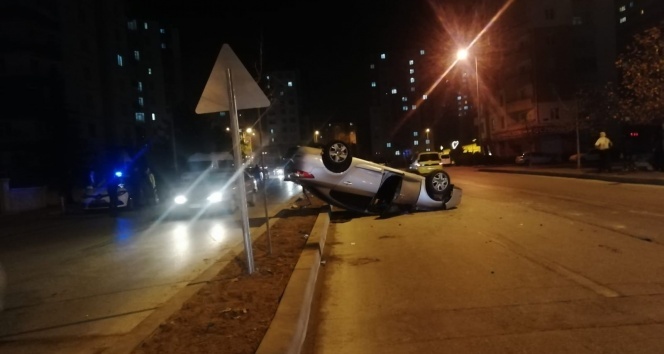 Takla atan otomobilden hafif yaralı kurtuldu