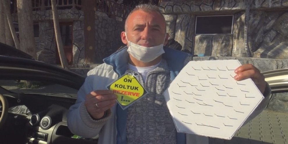 Ön koltuğa oturmasınlar diye çivilerle ’korona savar’ yaptı