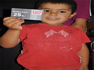 İHTİYAÇ SAHİPLERİNE GIDA YARDIMI