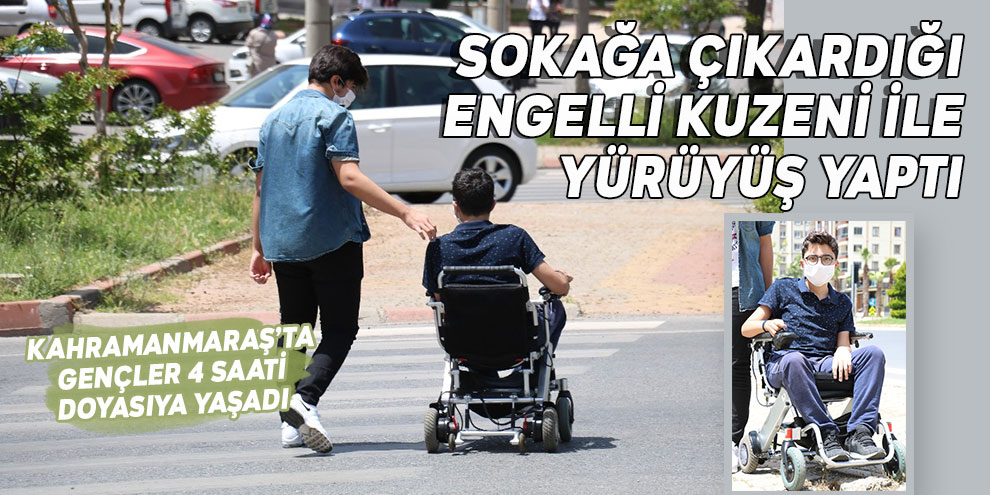 Kahramanmaraşlı genç, sokağa çıkardığı engelli kuzeni ile yürüyüş yaptı