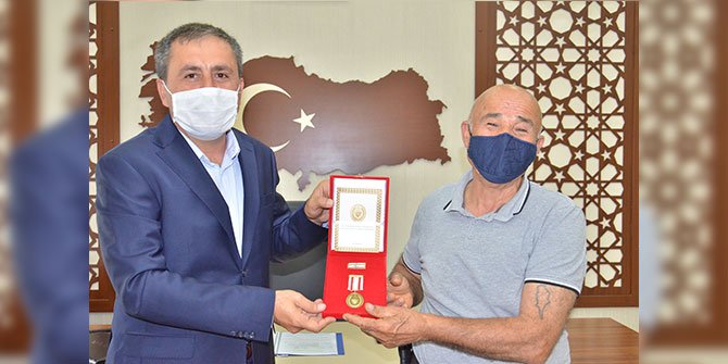 Kahramanmaraş'ta Kıbrıs gazisine madalya ve beratı takdim edildi
