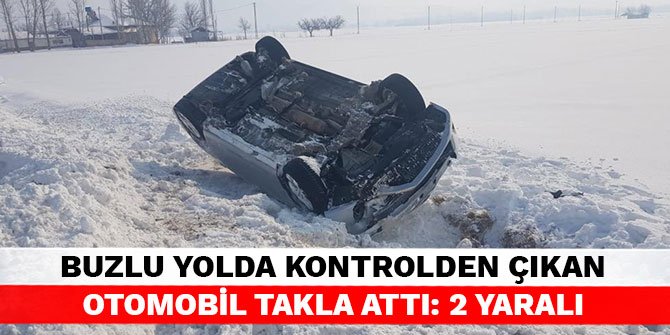 Buzlu yolda kontrolden çıkan otomobil takla attı: 2 yaralı